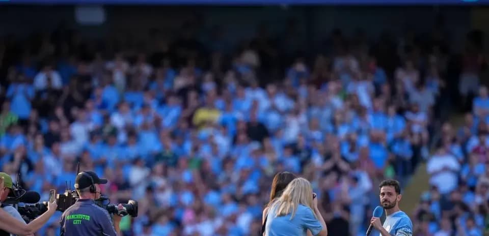 Bernardo Silva speaking to fans at stadium