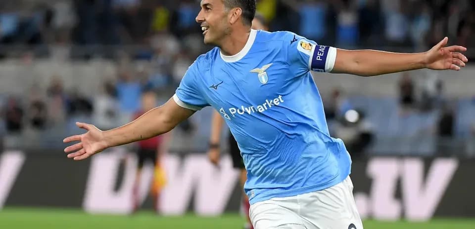 Player celebrating after scoring a goal for Lazio