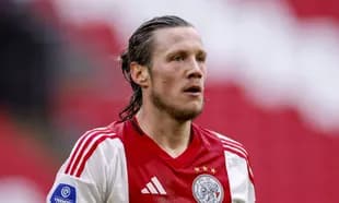 Player in Ajax jersey during a match