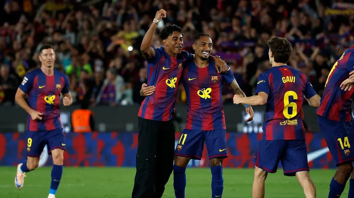 Barcelona players celebrating a goal during match