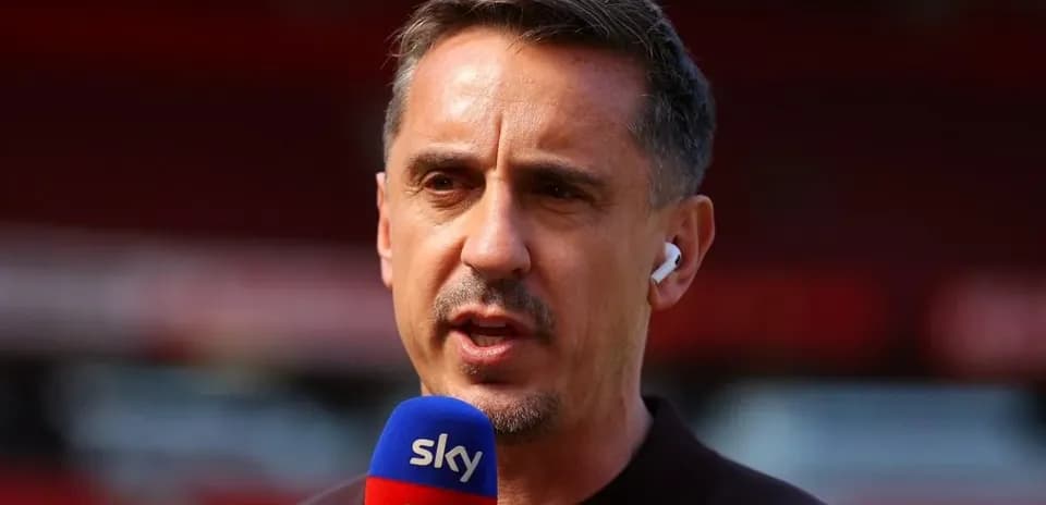 Sports commentator speaking into microphone on camera