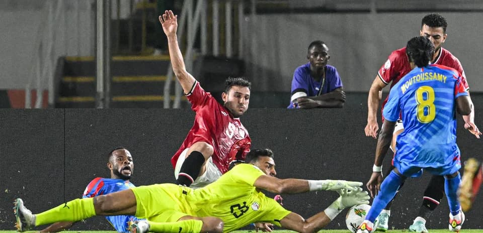 Players contesting for the ball in a match