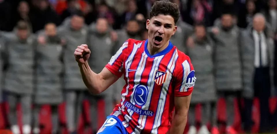 Atletico Madrid player celebrating a goal on field