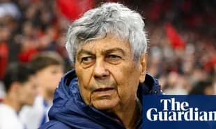 Coach observing the match from the sidelines