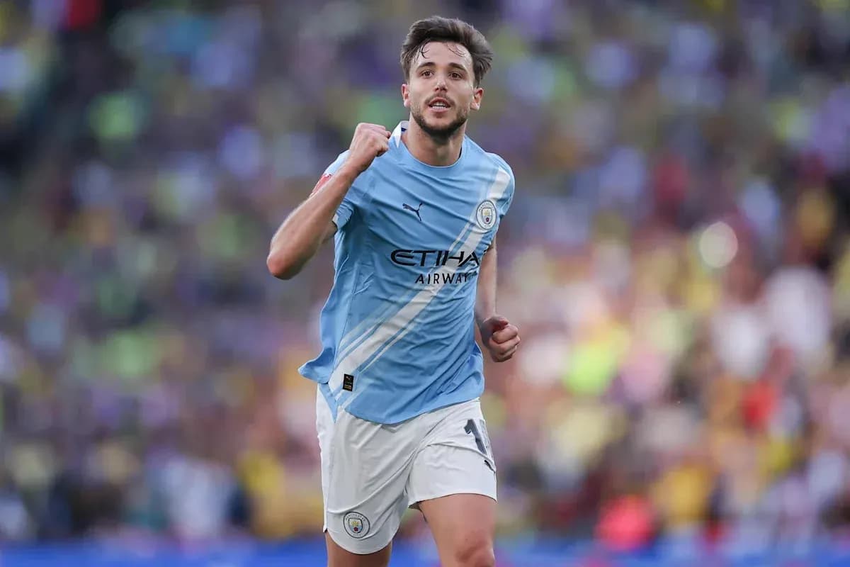 Player celebrating during match in light blue kit