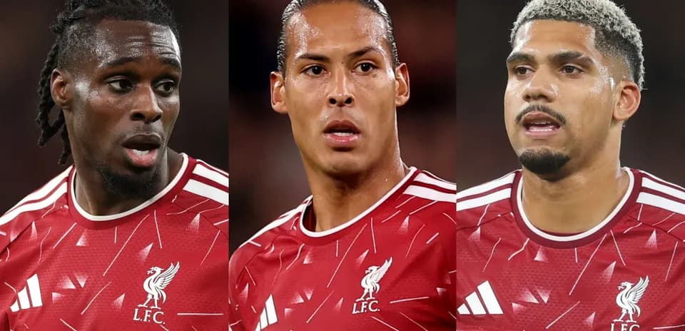 Three Liverpool FC players in red kits