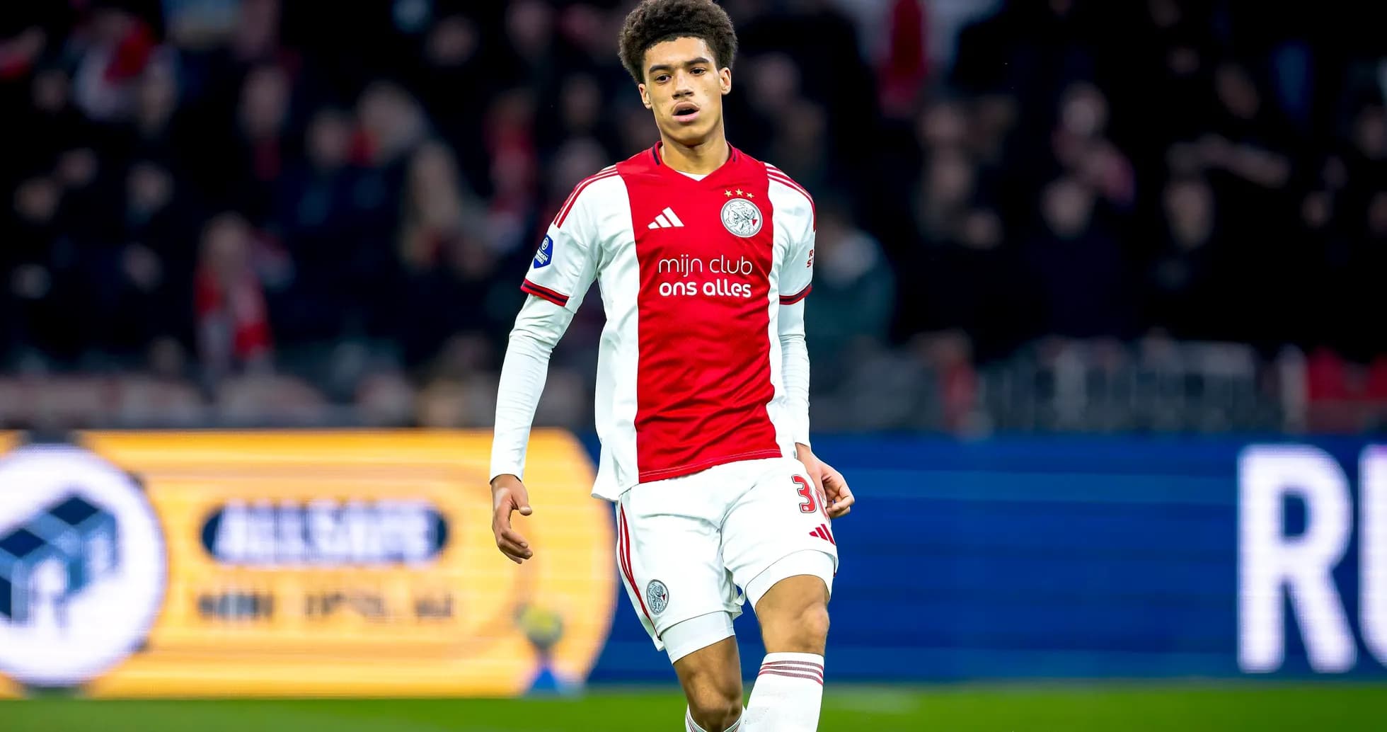 Ajax player walking on the pitch during match