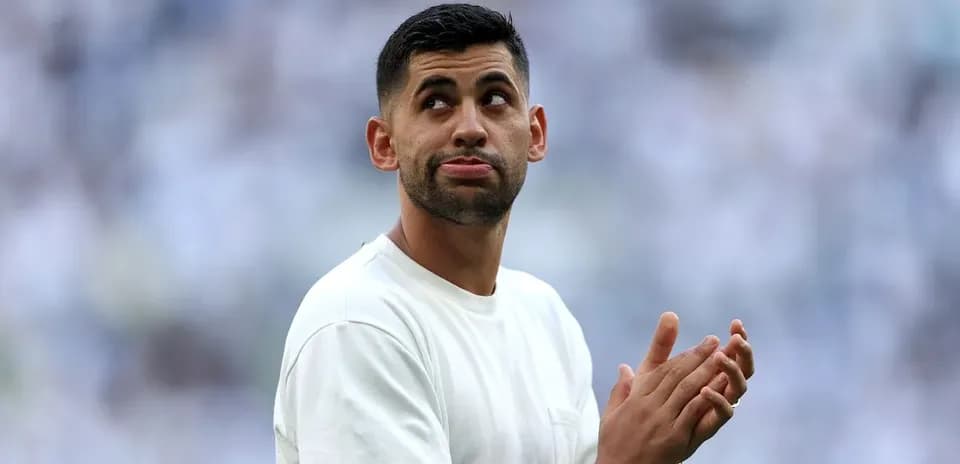 Player applauding during match warm-up on field