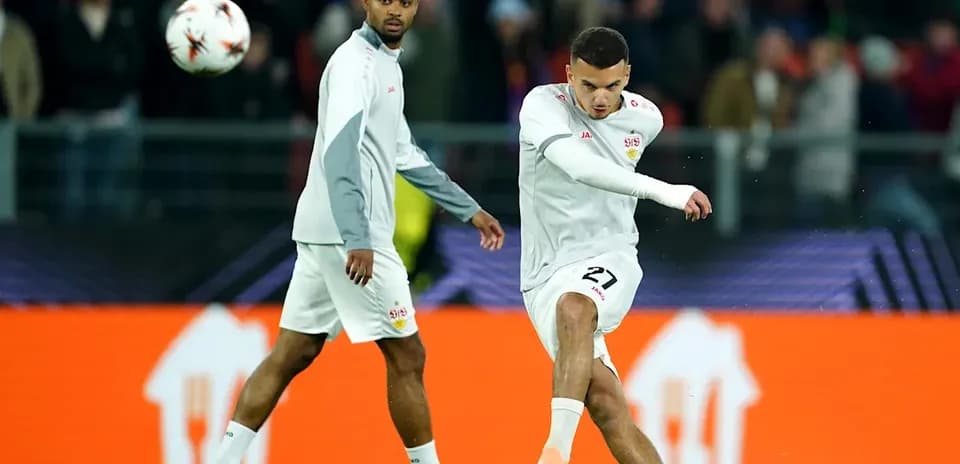 Player kicking ball during warm-up session
