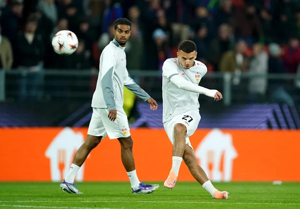 Player kicking ball during warm-up session