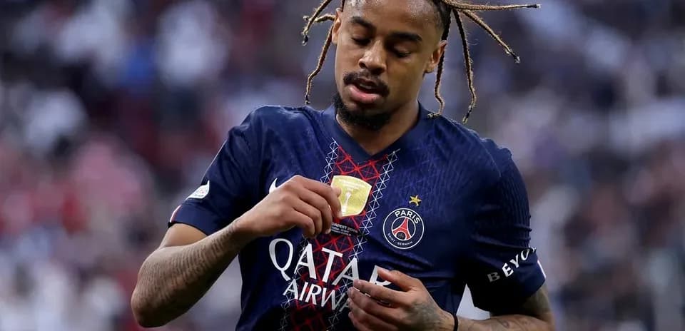 Player adjusting his jersey after match celebration