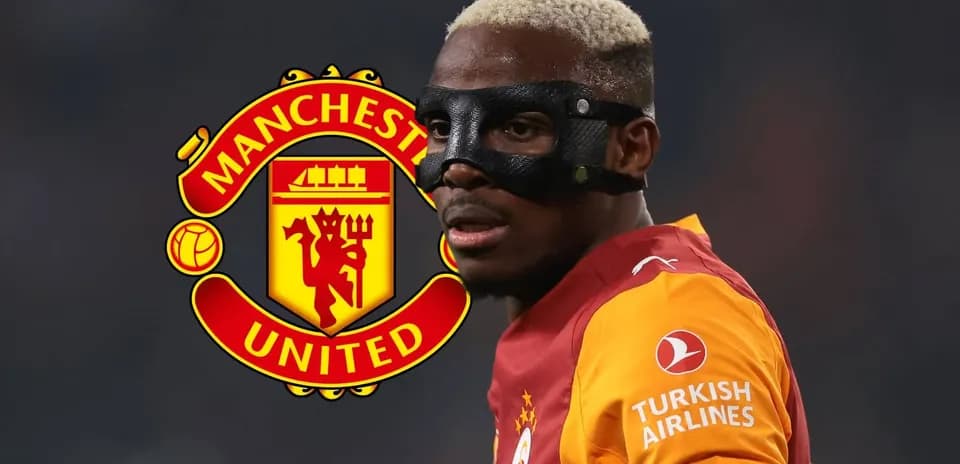 Player wearing mask, with Manchester United logo behind