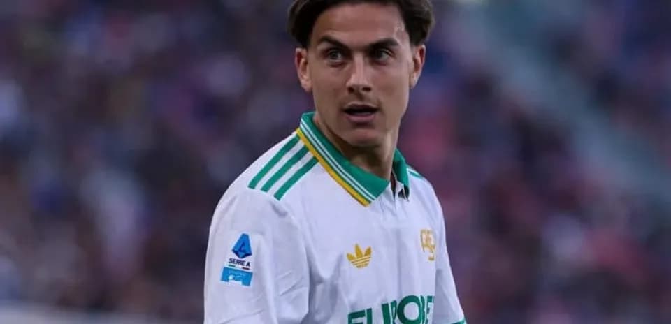Player in white jersey during a football match