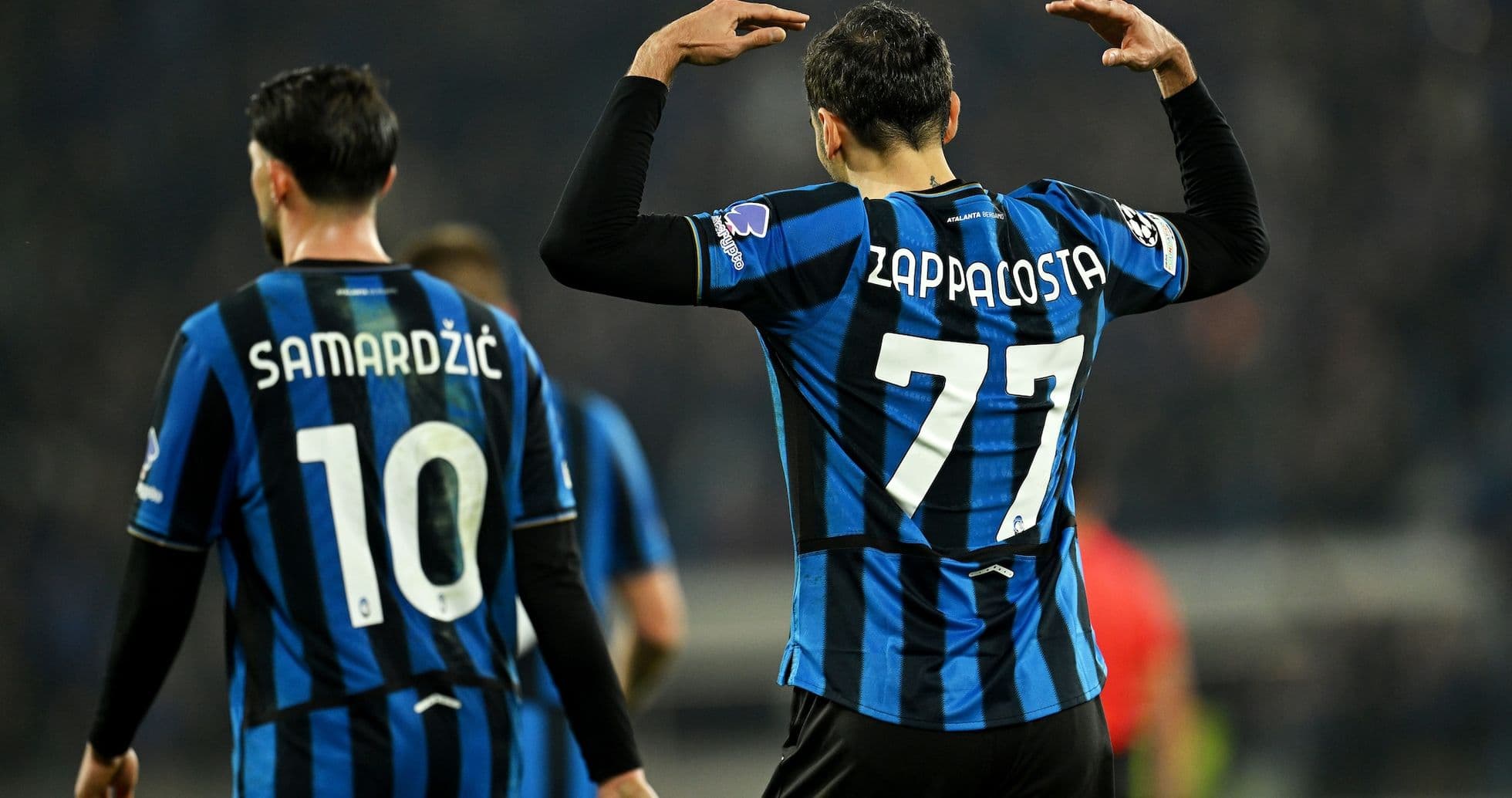 Atalanta players celebrating during Champions League match