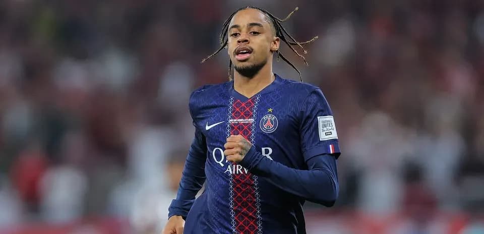 Player running during match in PSG jersey
