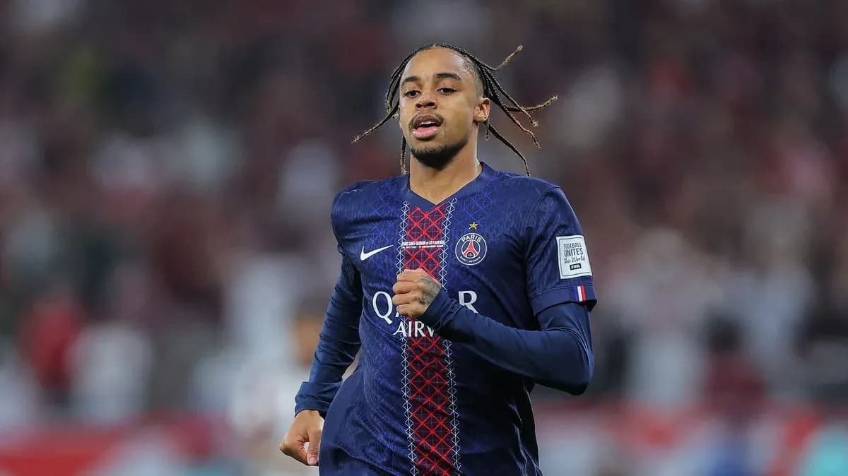 Player running during match in PSG jersey