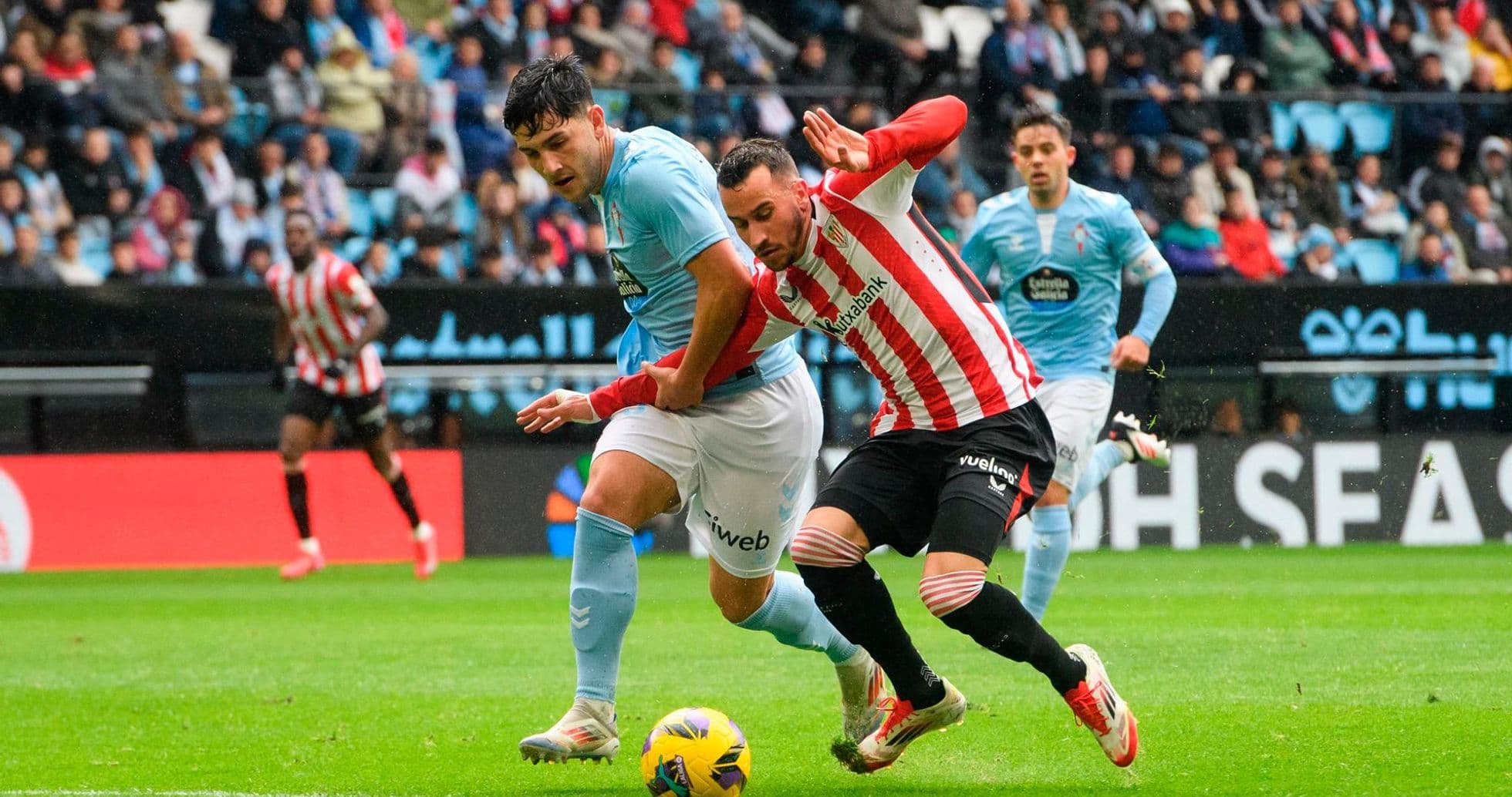 Athletic Club player tackles Celta Vigo opponent