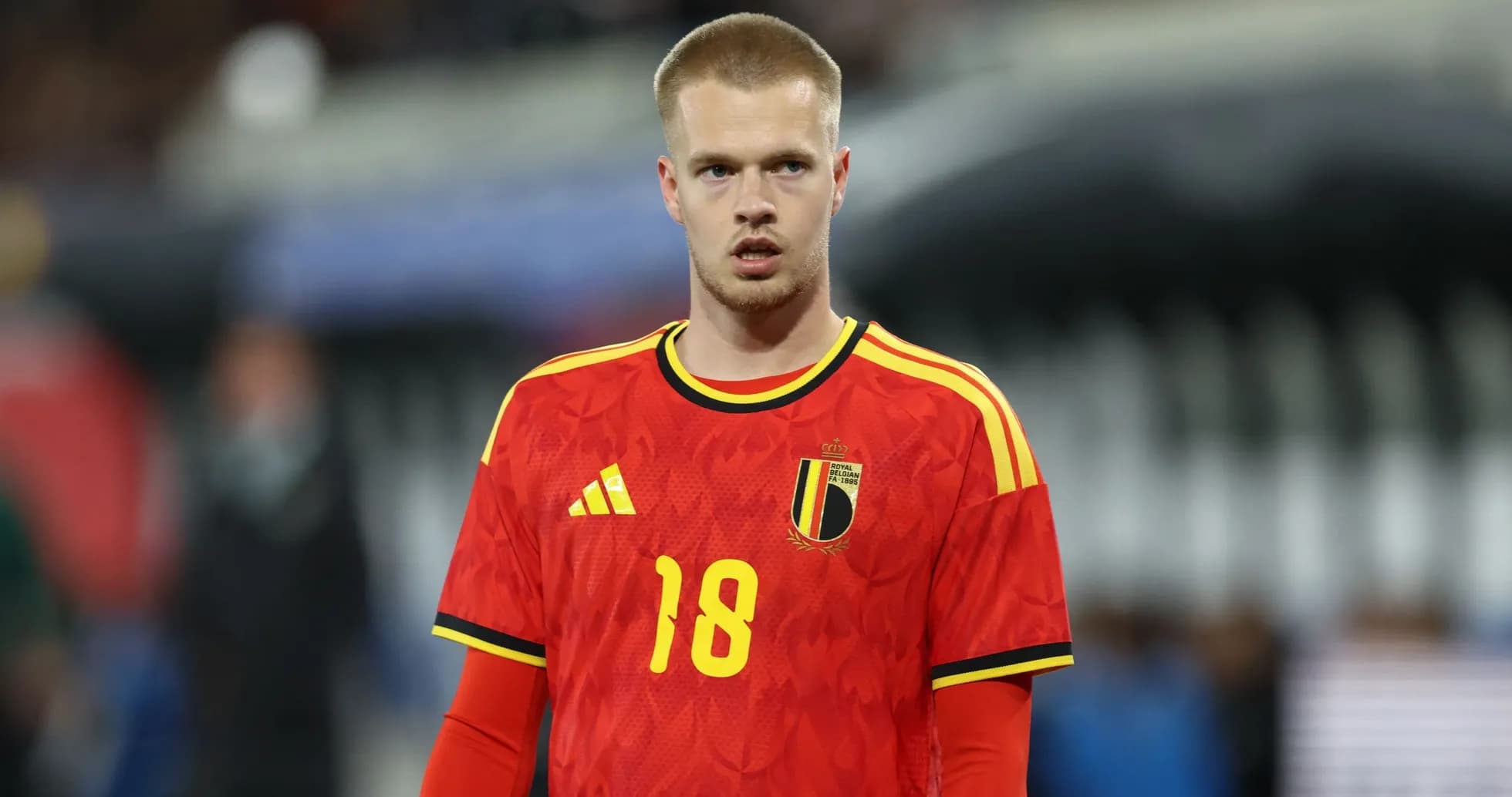 Player in red Belgium jersey during match