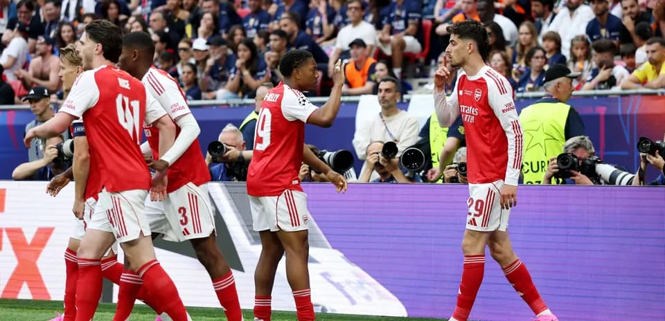 Arsenal players celebrating during a match