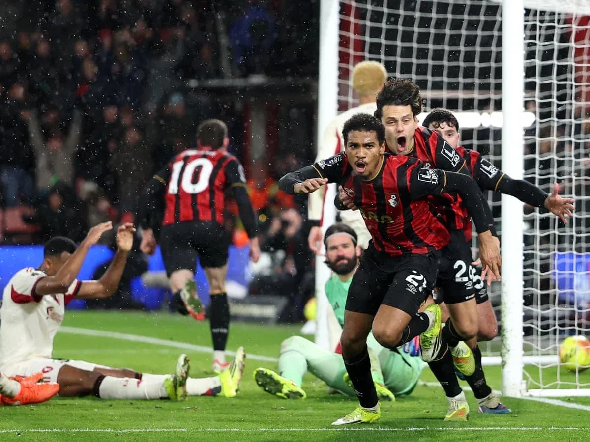 Bournemouth players celebrate a goal against Liverpool Bournemouth players celebrate a goal against Liverpool