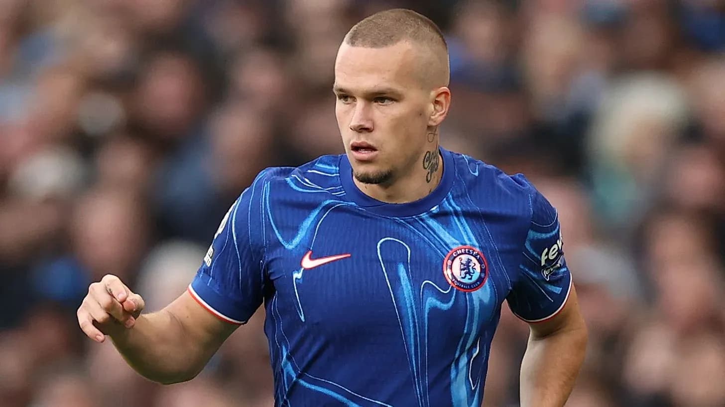 Player in blue Chelsea kit during match Player in blue Chelsea kit during match