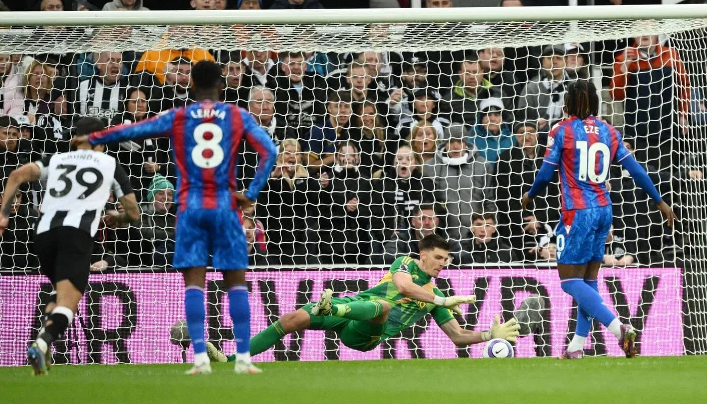Goalkeeper saving a penalty during match Goalkeeper saving a penalty during match