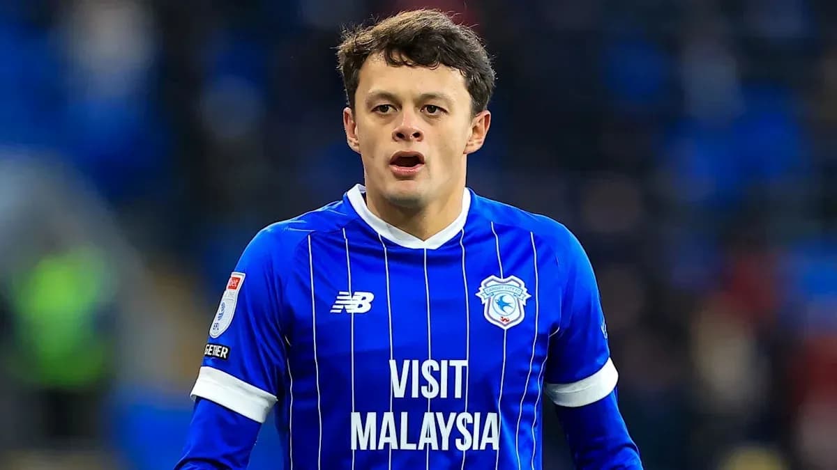 Player in blue jersey during football match Player in blue jersey during football match