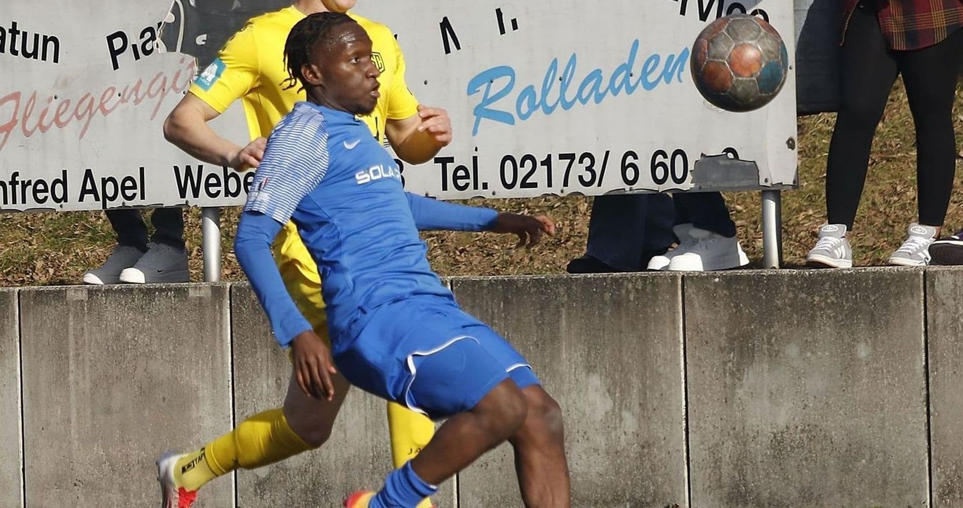 Player kicking ball during Büderich match Player kicking ball during Büderich match