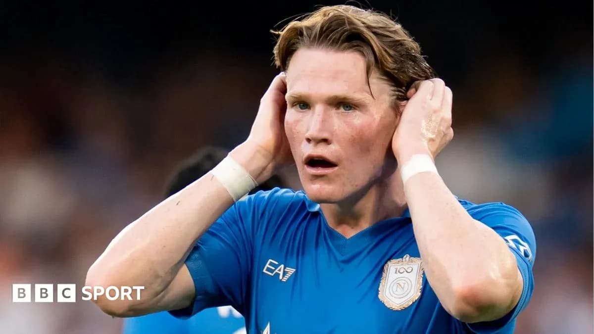 Player in blue jersey with hands on head Player in blue jersey with hands on head