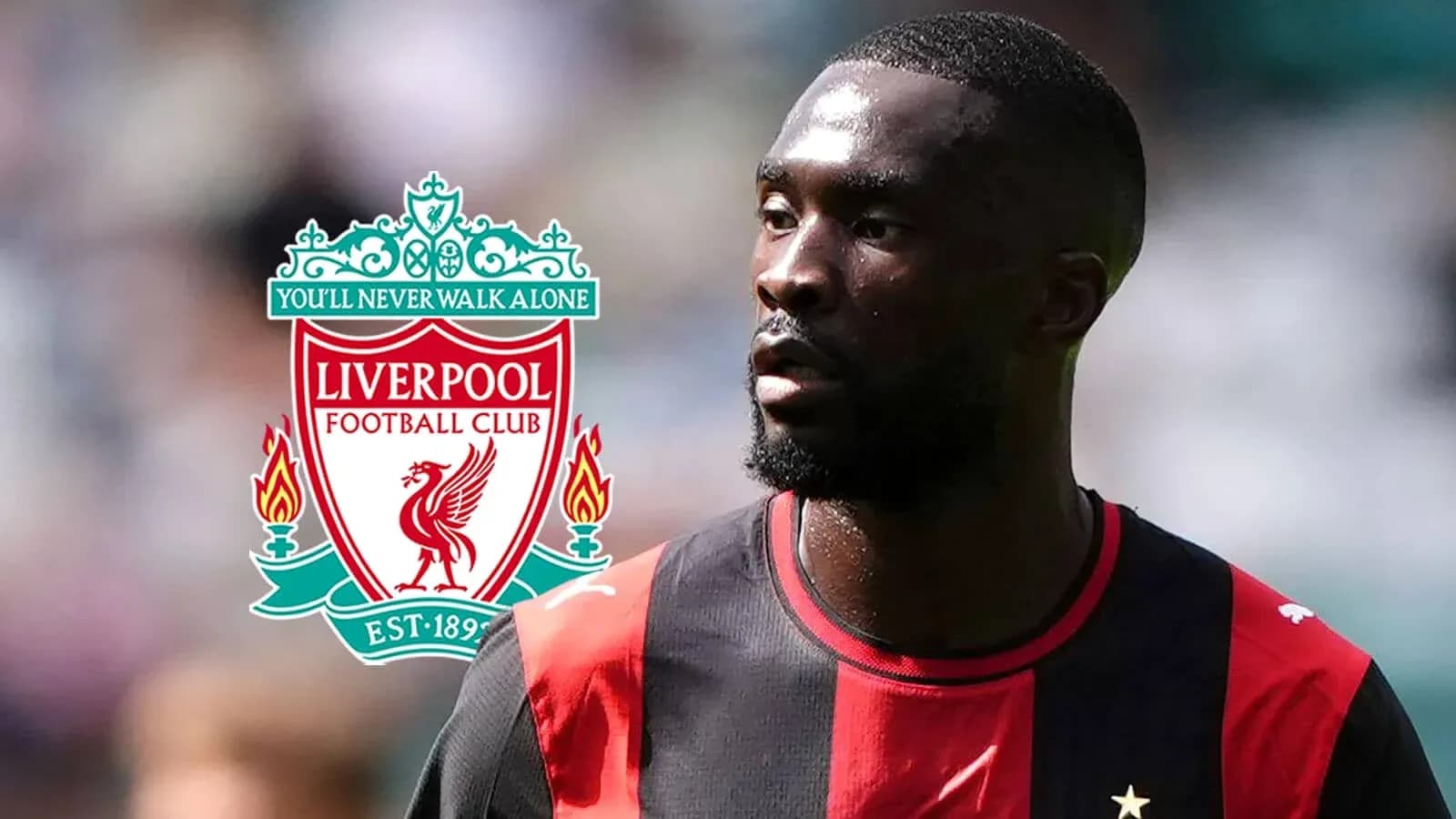 Player in jersey with Liverpool logo in background Player in jersey with Liverpool logo in background