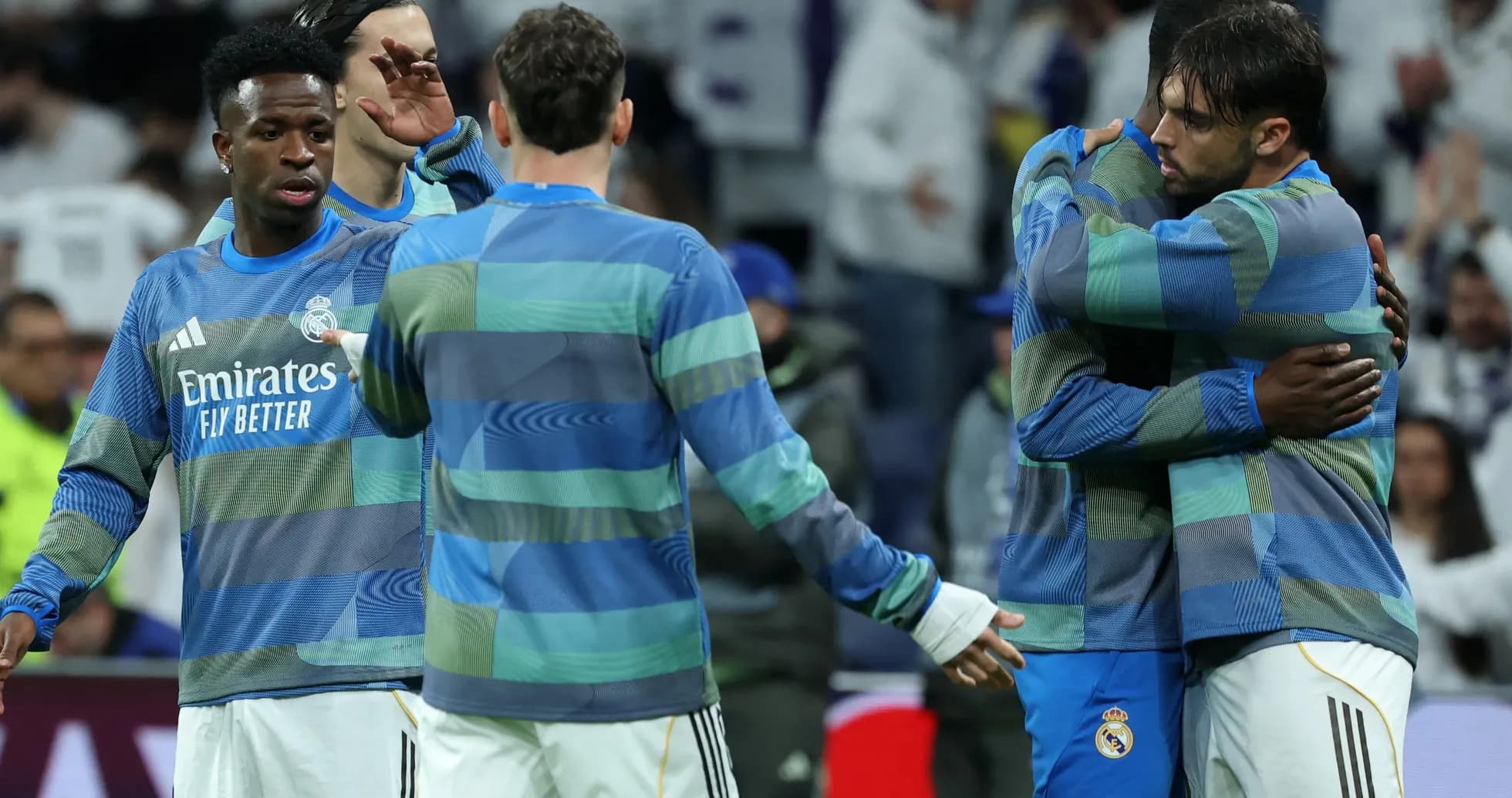 Real Madrid players embracing before the match Real Madrid players embracing before the match