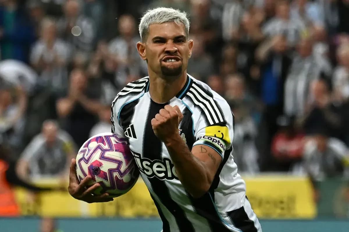 Player celebrating with the ball after scoring Player celebrating with the ball after scoring