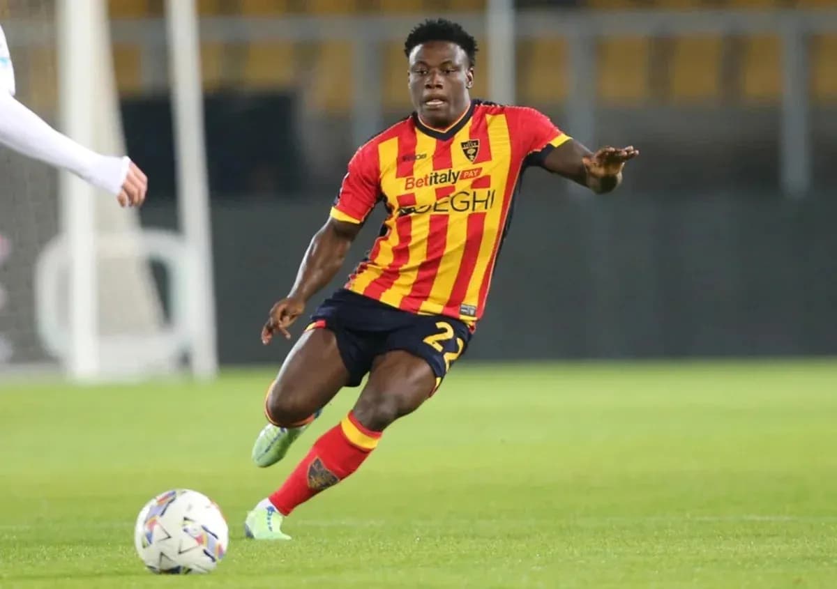 Player in action during a football match Player in action during a football match