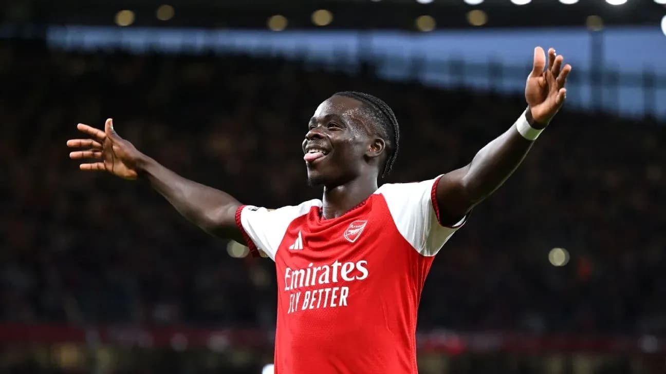Player celebrating goal with arms outstretched Player celebrating goal with arms outstretched