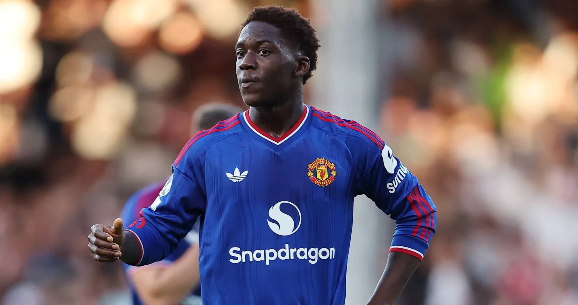 Player in Manchester United kit during match Player in Manchester United kit during match