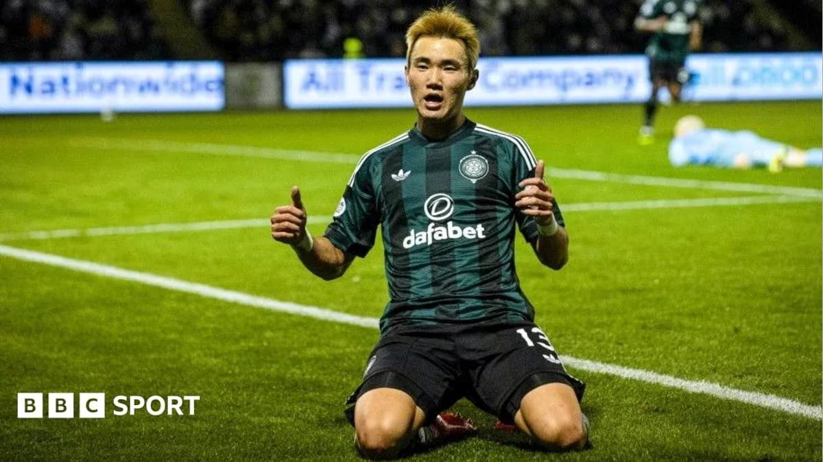 Player celebrating on the pitch after scoring goal Player celebrating on the pitch after scoring goal