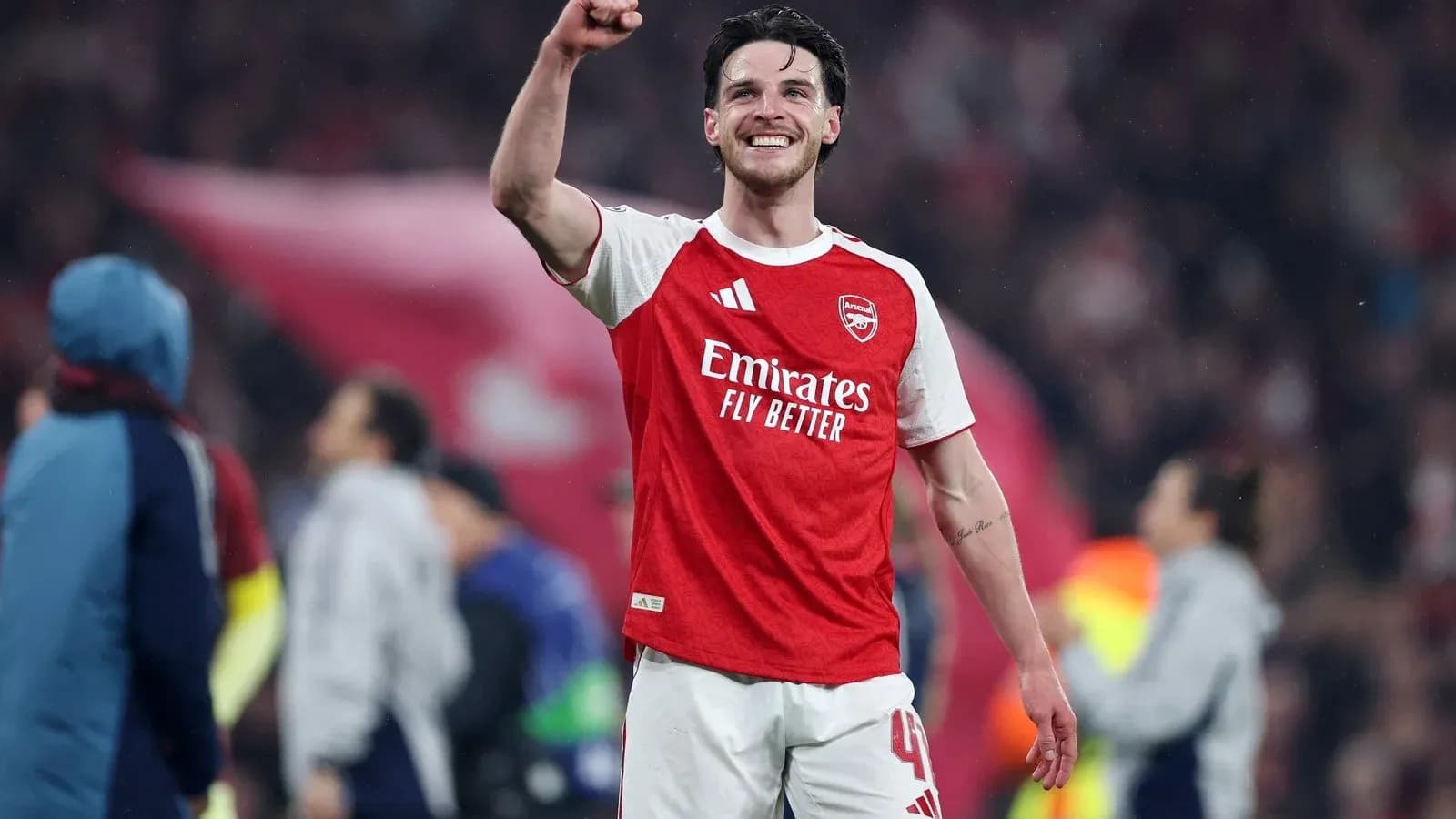 Arsenal player celebrating after match victory Arsenal player celebrating after match victory