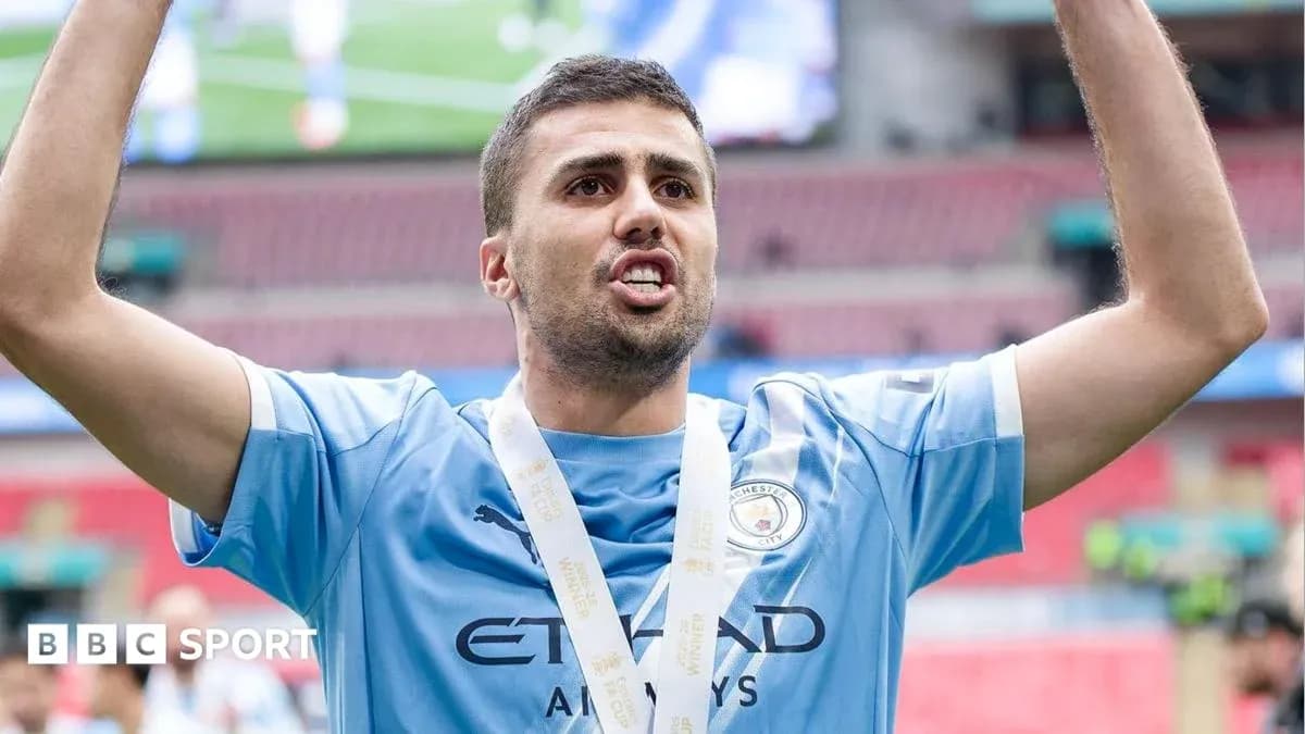 Player celebrating with medal after winning match Player celebrating with medal after winning match