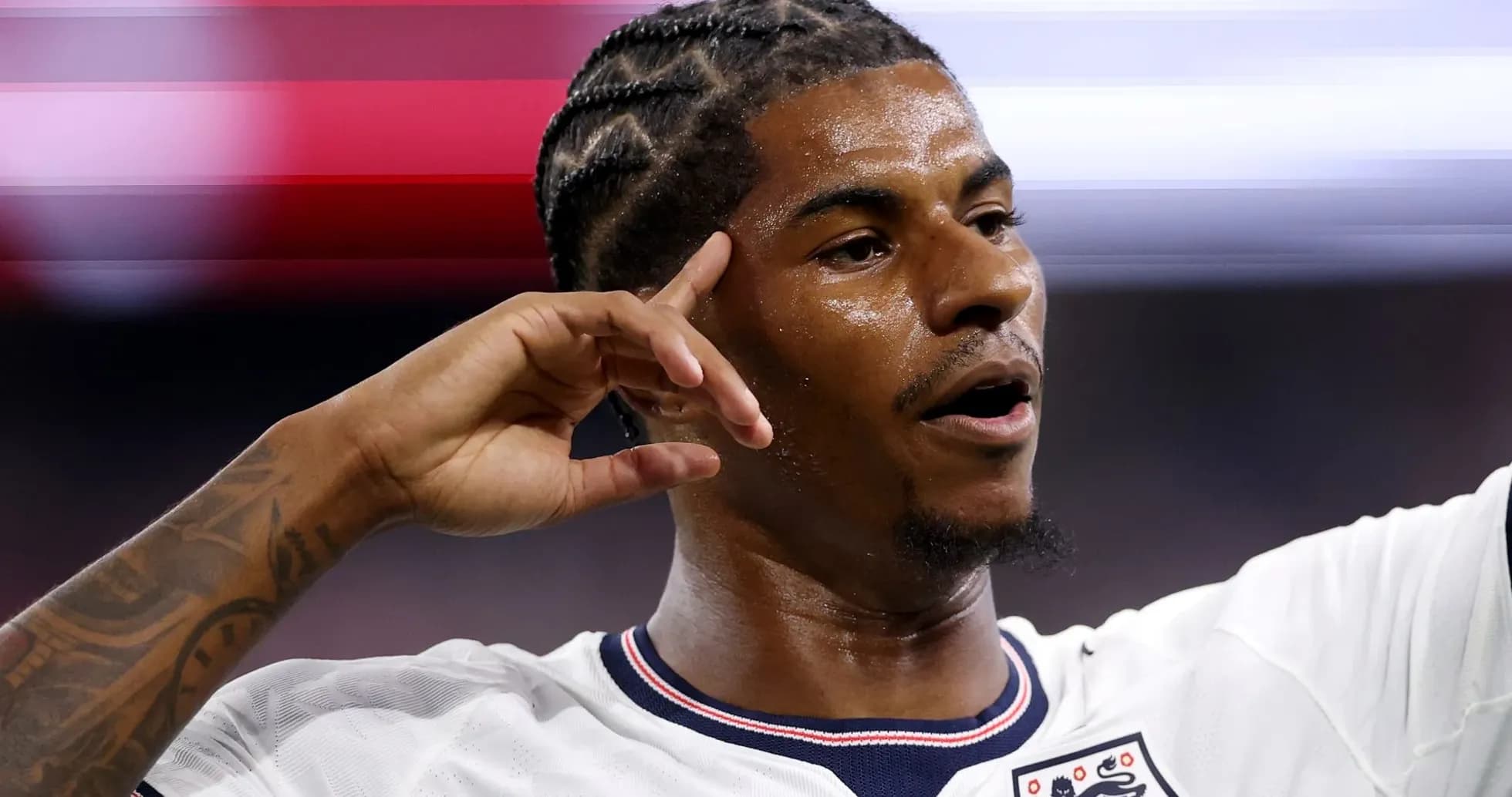 Player celebrating with hand gesture during match Player celebrating with hand gesture during match