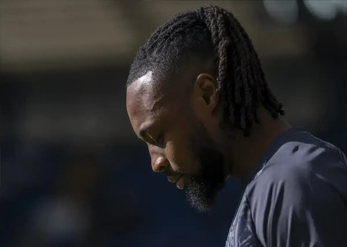 Player with head down during training session Player with head down during training session