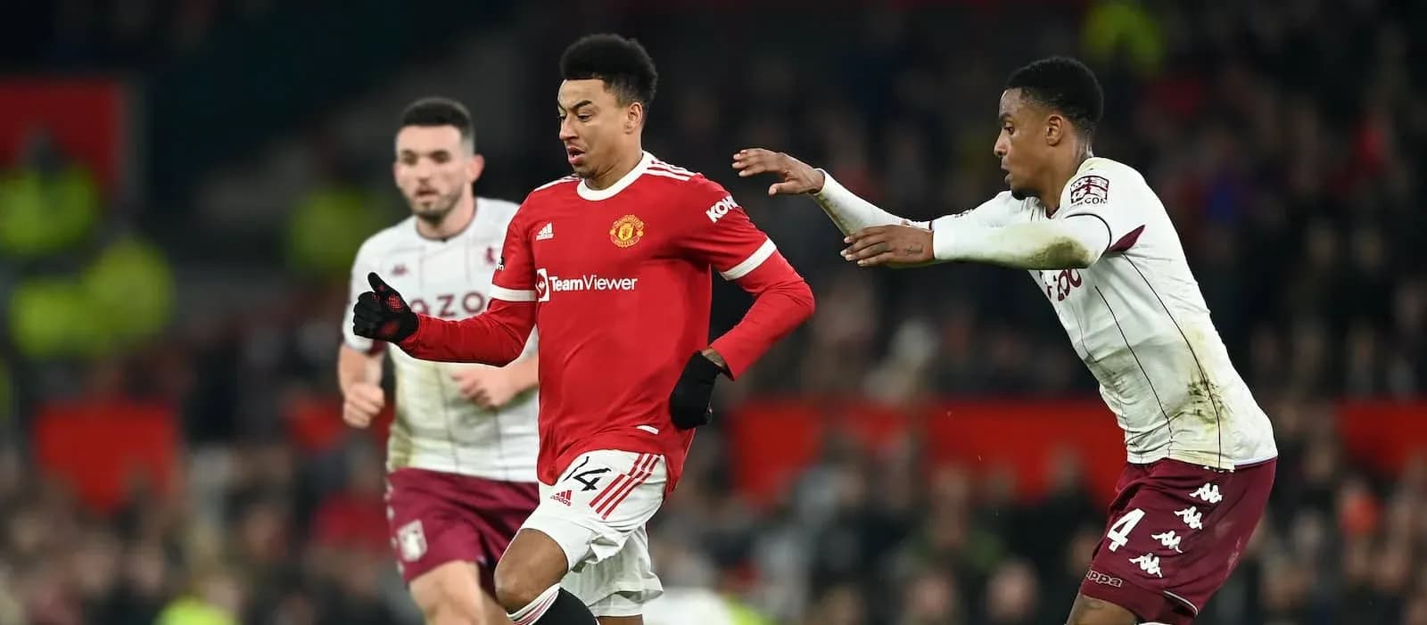 Manchester United player running with ball during match Manchester United player running with ball during match
