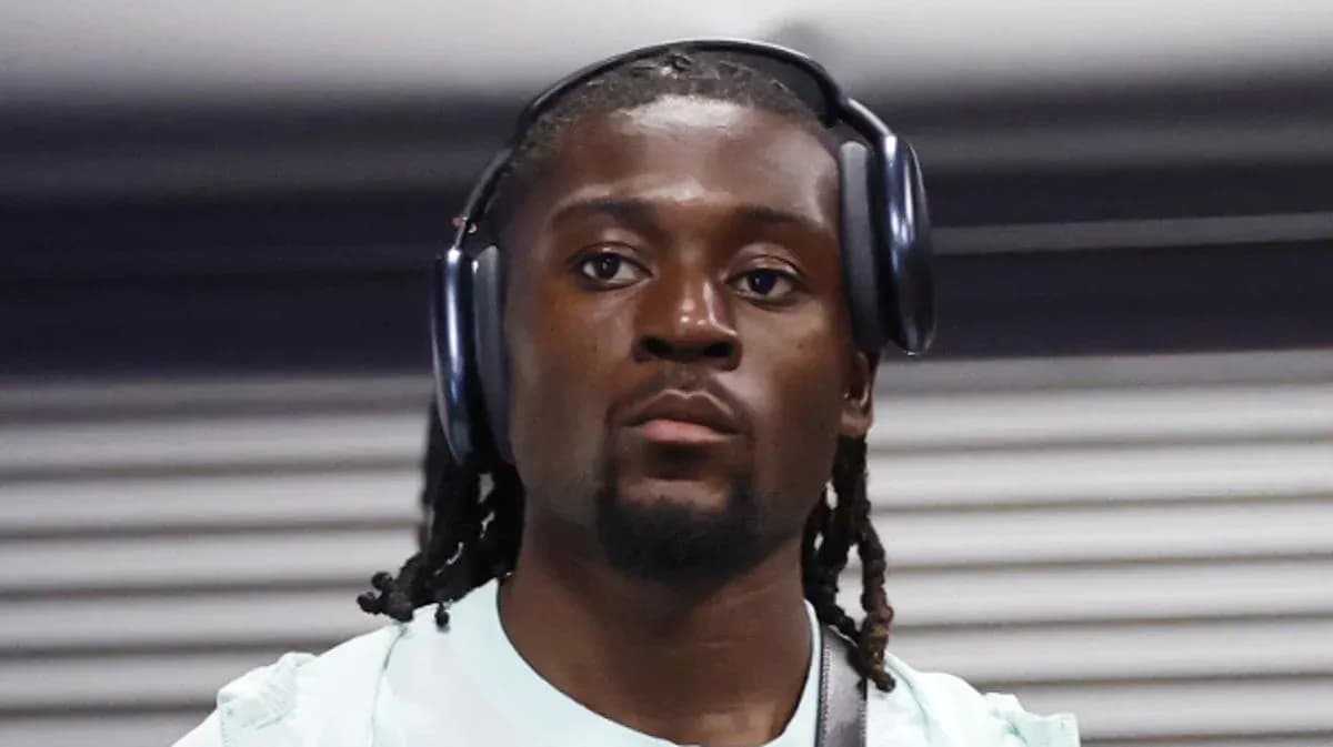 Player wearing headphones before a match Player wearing headphones before a match