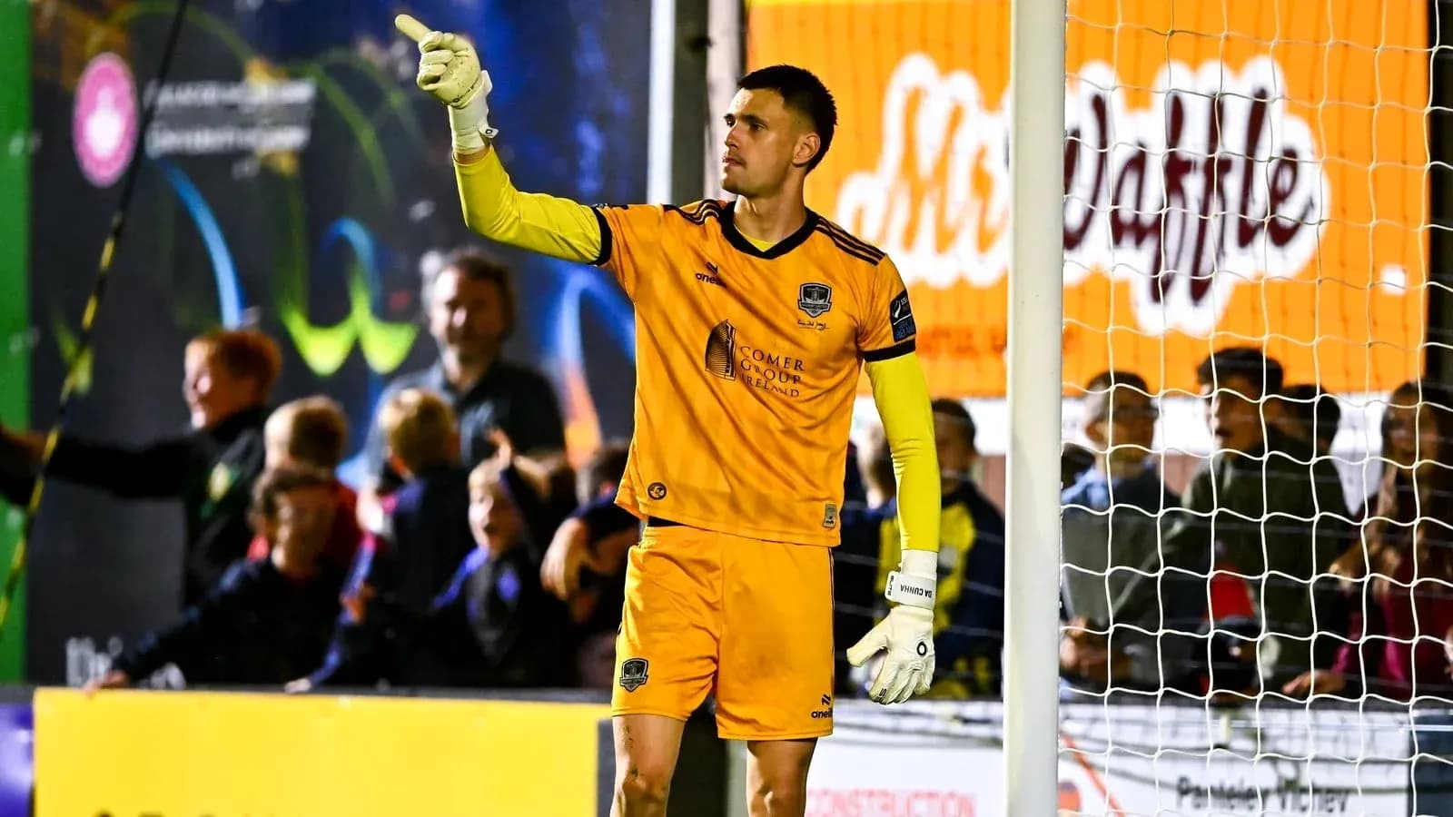 Goalkeeper signaling during a football match Goalkeeper signaling during a football match