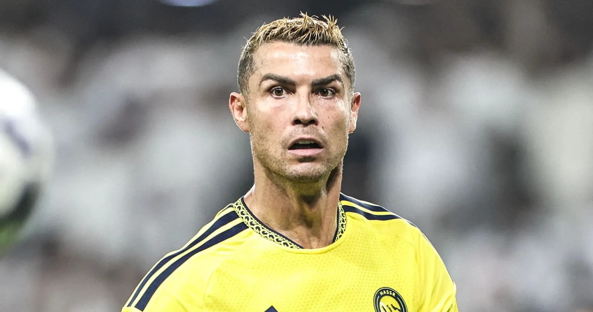 Player in yellow jersey during match action Player in yellow jersey during match action