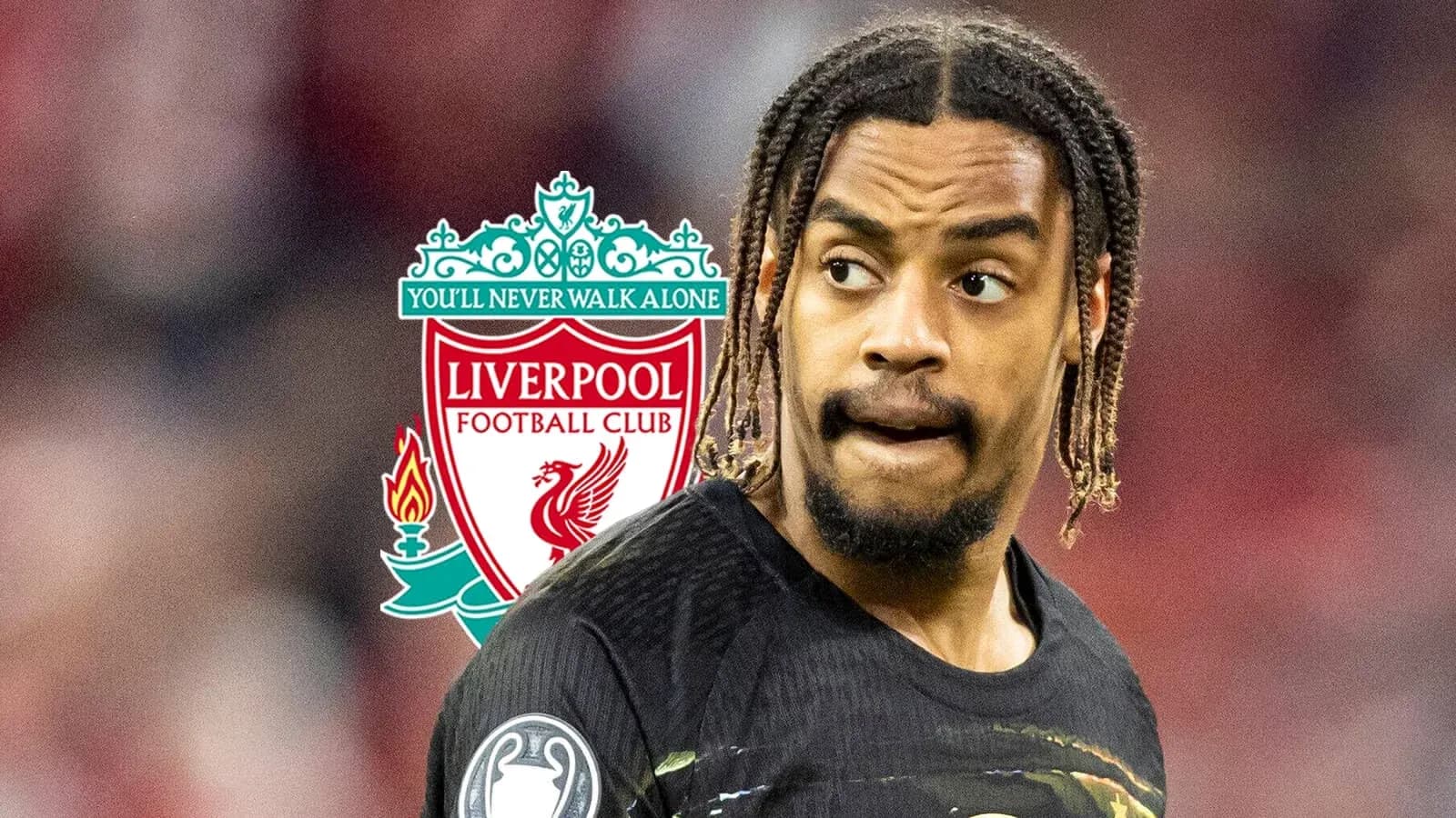 Player in Liverpool jersey with club logo behind Player in Liverpool jersey with club logo behind