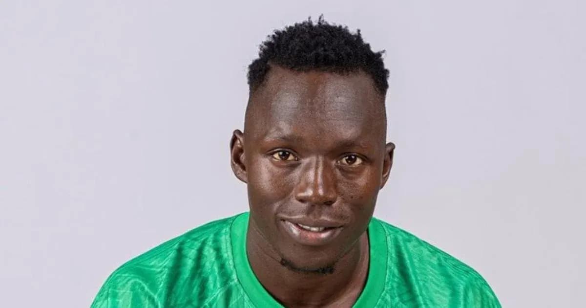 Player posing in green jersey with neutral background Player posing in green jersey with neutral background