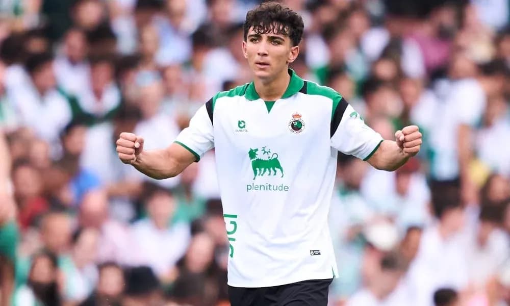 Player celebrating in a white and green jersey Player celebrating in a white and green jersey