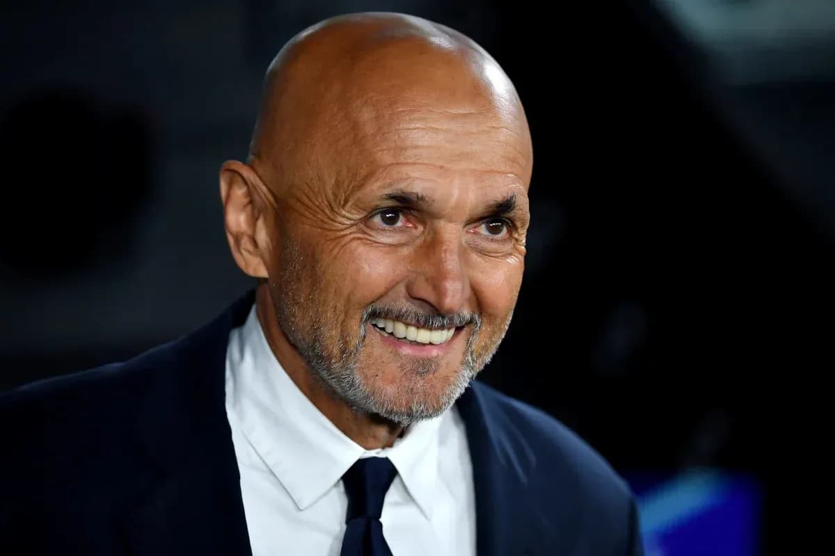 Smiling coach wearing a suit during event Smiling coach wearing a suit during event