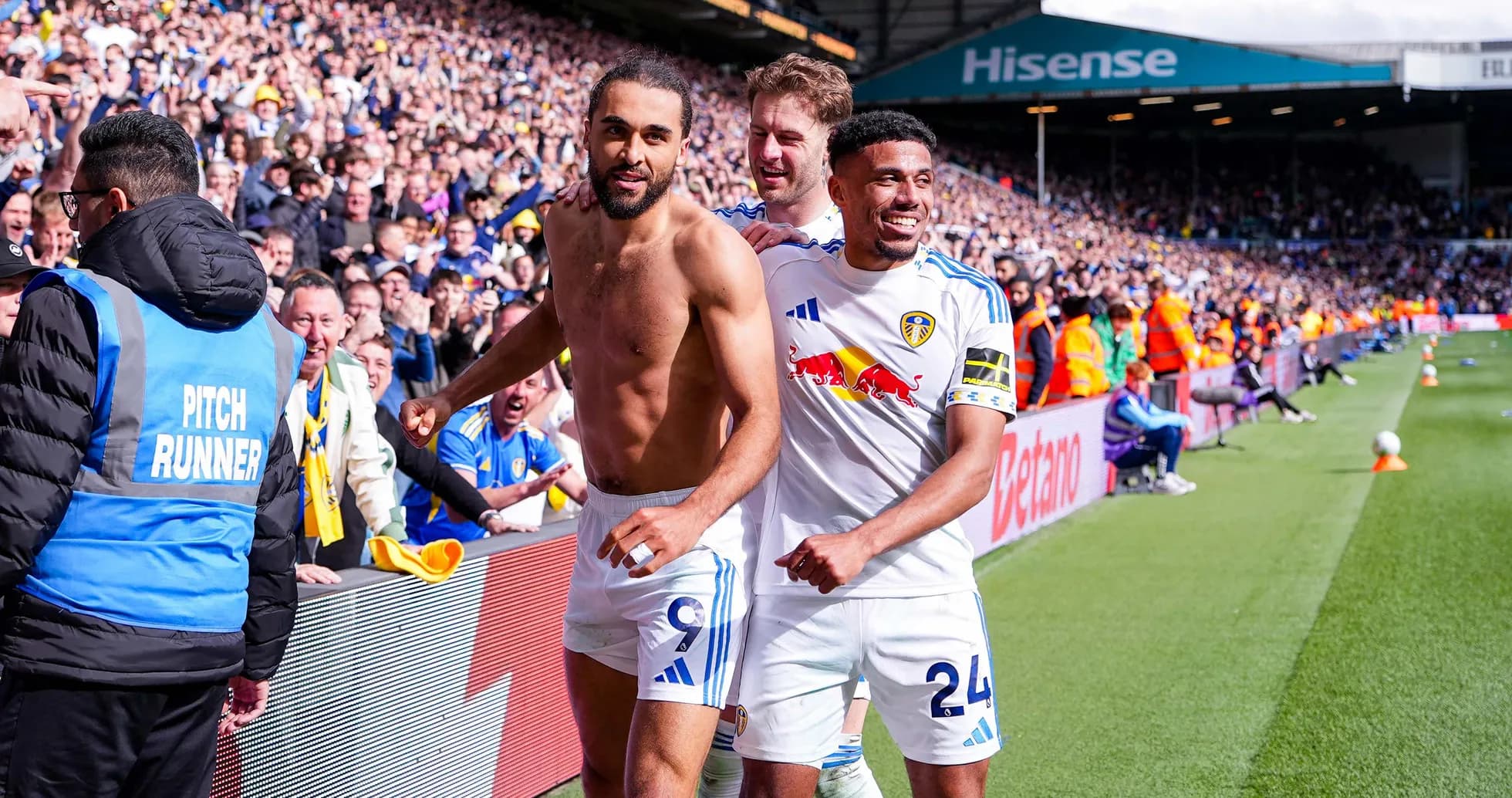 Leeds players celebrating after scoring a goal Leeds players celebrating after scoring a goal