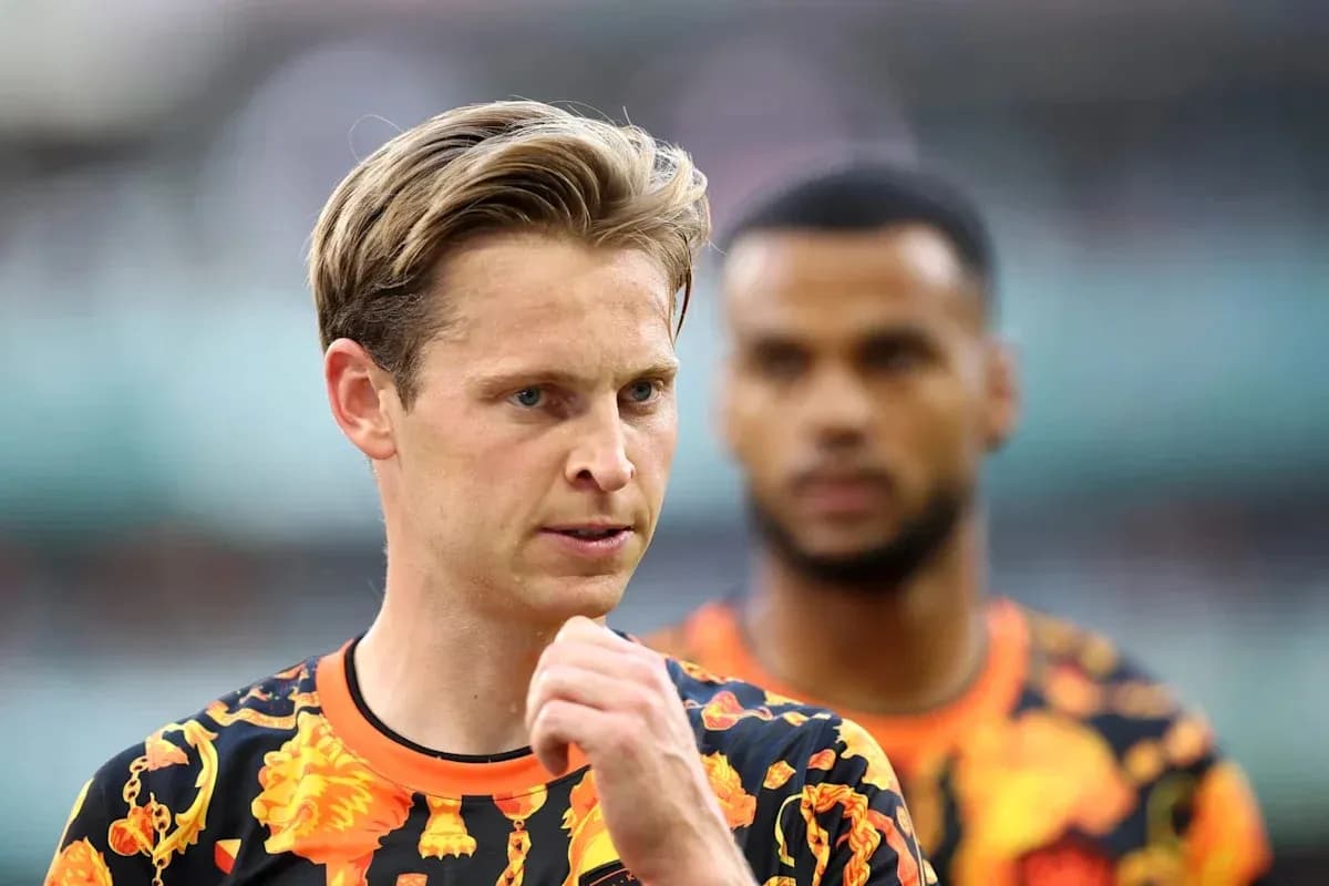 Two players in colorful training jerseys on field Two players in colorful training jerseys on field
